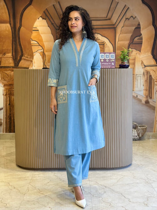 Grace in Blue: Timeless Elegance with Delicate Embroiderd