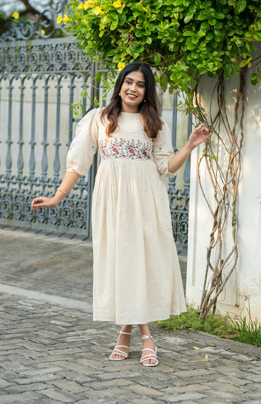 Soch Off-white flex cotton dress with floral embroidery and crochet lace detailing on yoke and sleeves